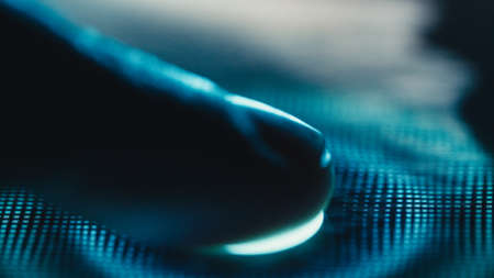 Digital finger print scanner in action. Close upの写真素材