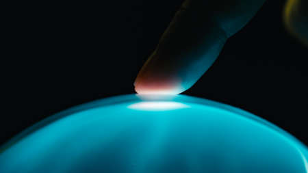 human finger interacts with artificial intelligenceの写真素材