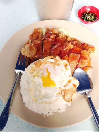 Sweet and sour chicken chop rice with egg の素材