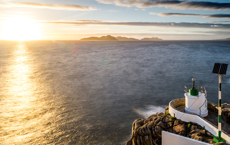 My favorite playgroud. Sunset at Monteferro lighthouse, beautiful view to Cies island.の写真素材