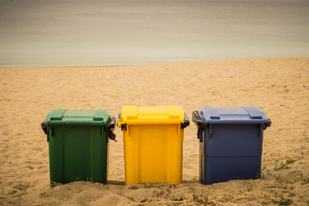 Three, the number; three, the colors: green, yellow and blue for a clean world. Taken in Coroso beach in Riveira, Galicia (Spain) in a morning walk hanging up with my camera.の写真素材