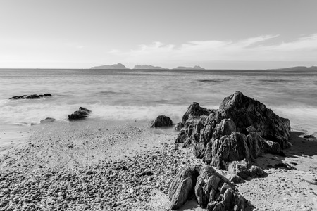 Daylight long exposure photo from Ducks beach in Nigran, Galicia (Spain). Islands watching over like a sentinel.の写真素材