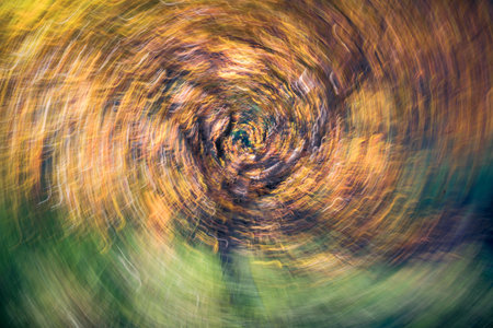 Abstract motion blur effect. Colorful autumn background. Long exposure.