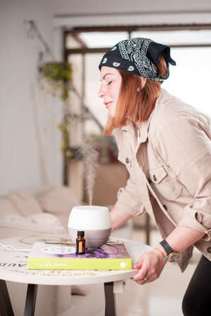 Woman Smelling Essence of Oils, HOME kit set doTERRA Essential Oil Oil Diffuser for making high...