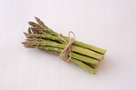 bunch of asparagus ready to cookの写真素材