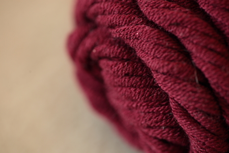 Wool skeins of yarn and knitting needlesの写真素材