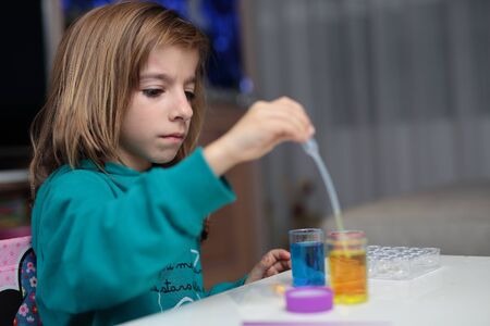 girl experimenting With the primary colorsの写真素材