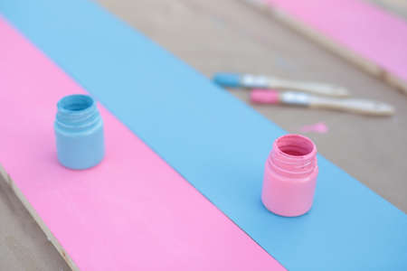 wooden planks painted blue and pink