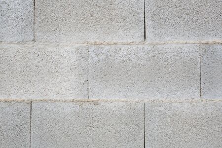 bottom of a block wall unplastered