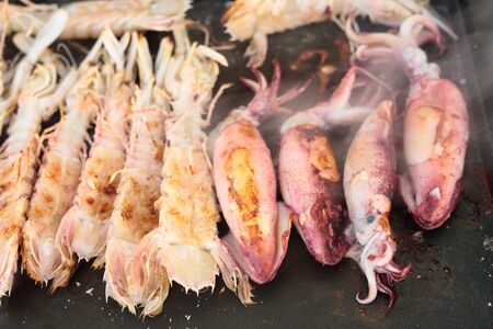 cooking seafood on a plate on a terrace
