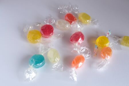 sweets of various flavors in a glass vessel