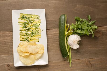 Agrios vegans and chips on a wooden backgroundの写真素材