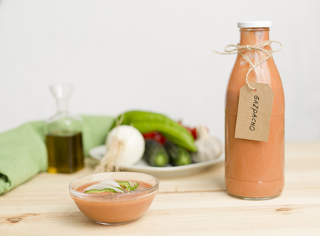 Andalusian gazpacho with ingredients on a wooden background pineの写真素材