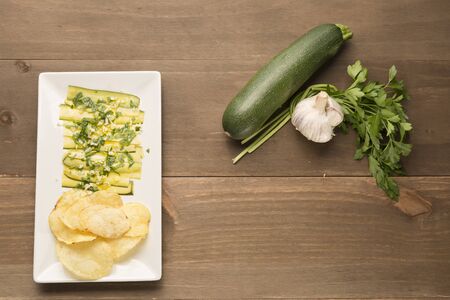 Agrios vegans and chips on a wooden backgroundの写真素材