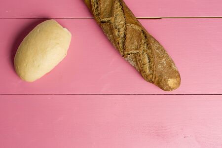 bread on a background painted pinkの写真素材