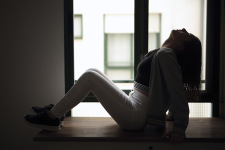 Portrait of girl with natural light to backlight. horizontal shootingの写真素材