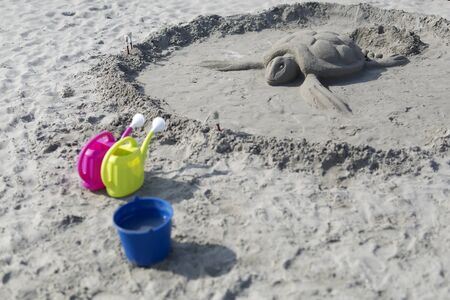 Sand sculptures from the beach made with the help of boys and girls.の写真素材
