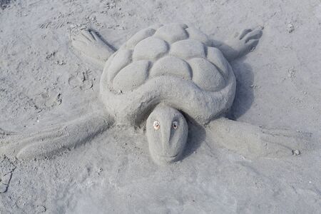 Sand sculptures from the beach made with the help of boys and girls.の写真素材
