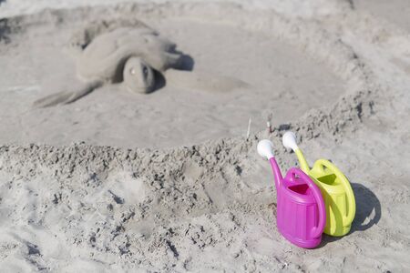 Sand sculptures from the beach made with the help of boys and girls.の写真素材