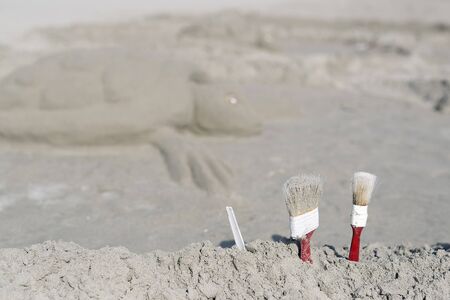 Sand sculptures from the beach made with the help of boys and girls.の写真素材