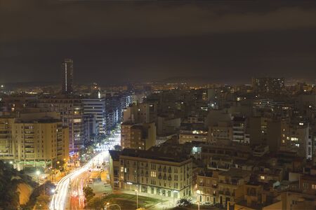 Skiline of the City of Alicante at night. Vertical shot.の写真素材