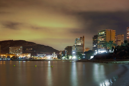 Alicante at night from Albufera beach, Valencian community in Spain.の写真素材
