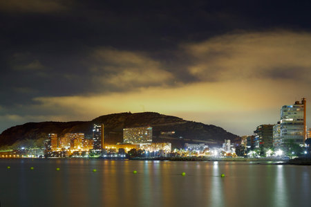 Alicante at night from Albufera beach, Valencian community in Spain.の写真素材
