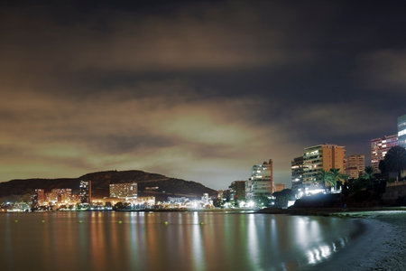 Alicante at night from Albufera beach, Valencian community in Spain.の写真素材
