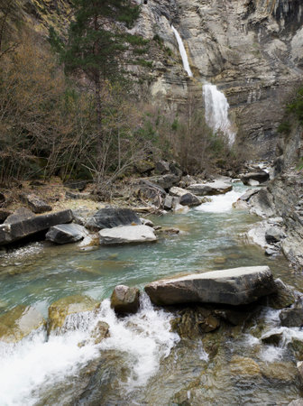 Sorrosal waterfall in Broto, in the Aragonese Pyrenees. Vertical shot in broad daylight.の写真素材