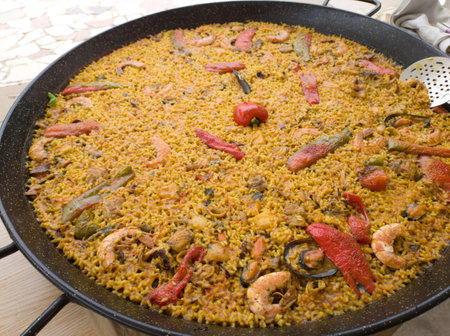 Homemade fish paella. Vertical shot with natural light.の写真素材