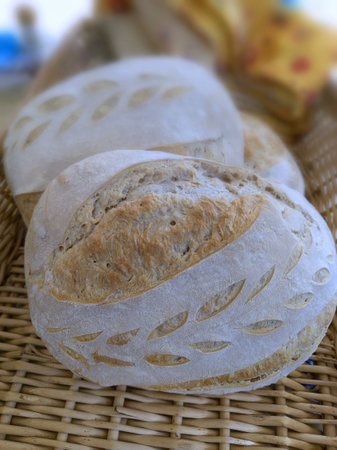 Homemade organic sourdough bread. Vertical shot with natural light.の写真素材