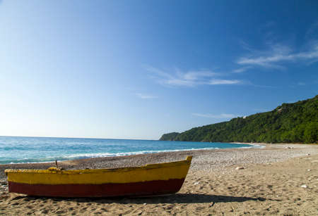 Embarking fishermen stranded on the beachの写真素材