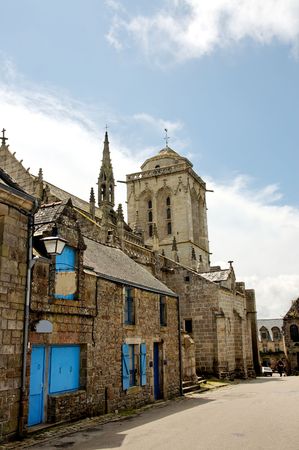 Old Britton Village with little stone houses and magnificent churchの写真素材