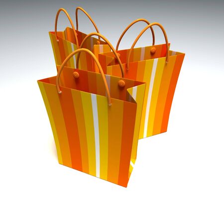 3D rendering of a trio of good quality orange striped shopping bags against a white backgroundの写真素材