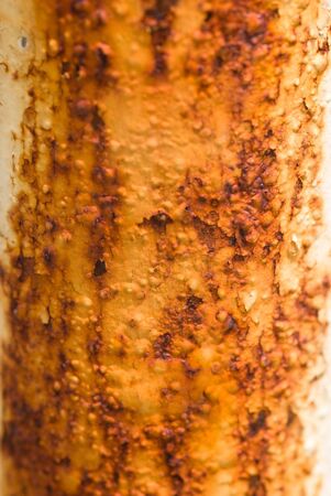 Rusted pipe with peeling paintの写真素材