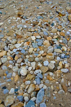 Pebbles on the beach sandの写真素材