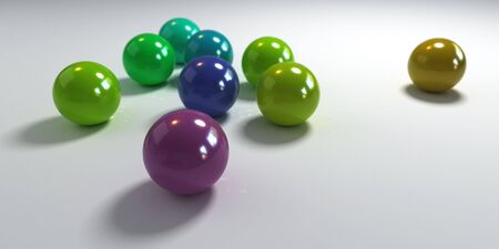 3D rendering of balls in blue, green, and purple shades on a white backgroundの写真素材