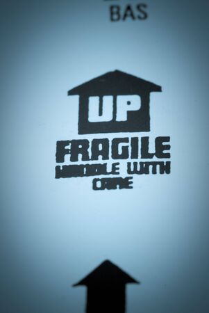Symbol indicating a package is fragile, handle with careの写真素材