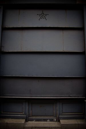 Old shop with closed shuttersの写真素材