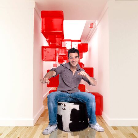 Happy young man in a surreal decorの写真素材