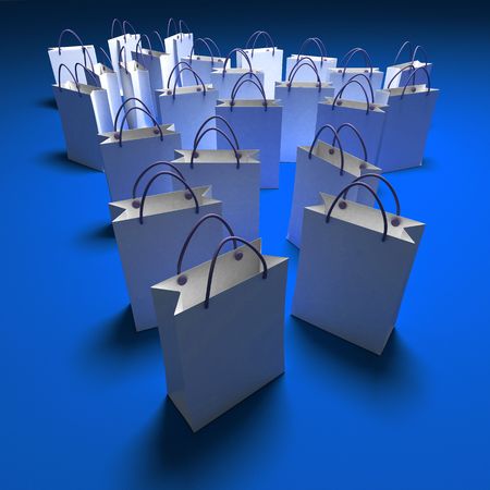 White paper shopping bags against a blue backgroundの写真素材