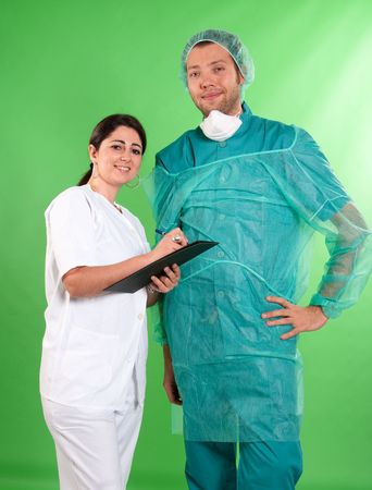 
Surgeon and nurse in operating clothes looking at the camera
の写真素材