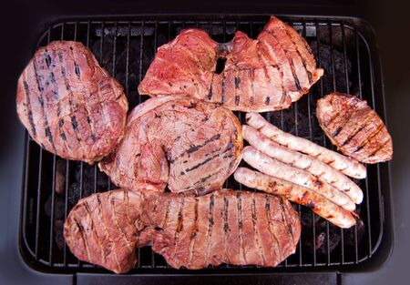 Meat on the barbecue grillの写真素材