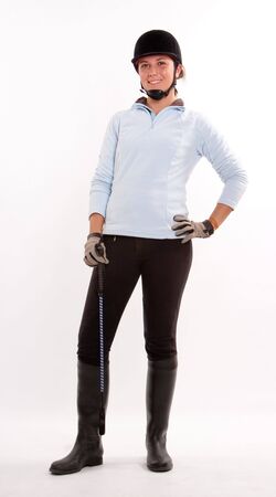 
Isolated image of a teenage girl dressed in horse riding clothes
の写真素材