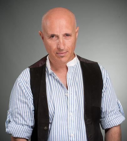Bald mature man looking at the cameraの写真素材