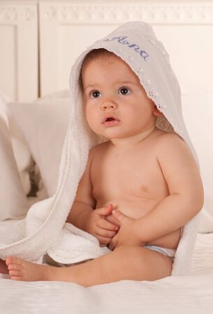 
Baby with a towel after the bath 
の写真素材