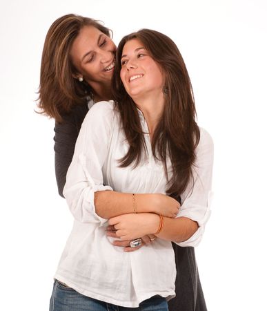 
Isolated image of a mother and daughter in a happy embrace 
の写真素材