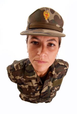 Female soldier staring at the camera with a white background