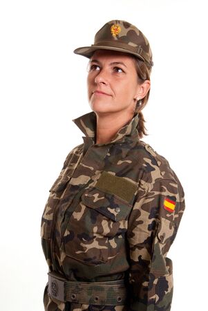 Female soldier saluting against a white backgroundの写真素材