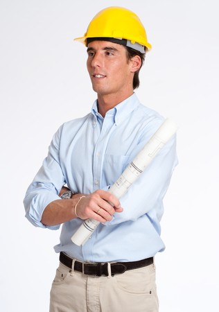 
Portrait of a young man with a safety helmet, holding a roll of blueprints
の写真素材